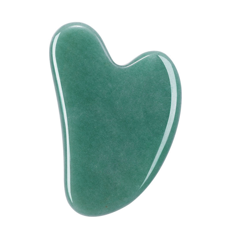 Soft green aventurine gua sha stone with satin finish, heart-shaped facial massage tool