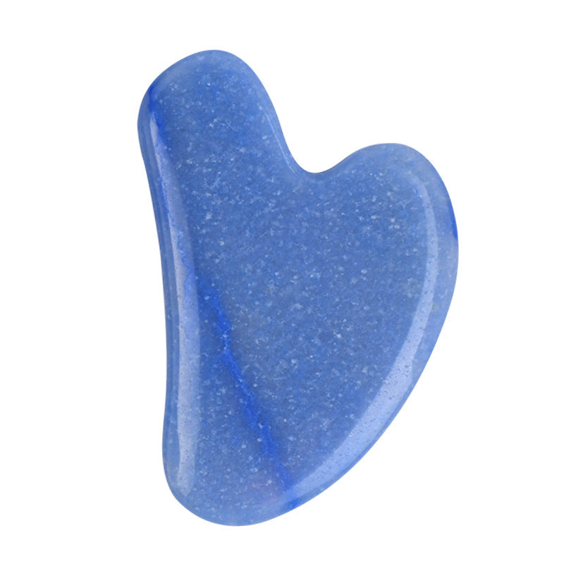 Blue aventurine gua sha stone in deep blue-grey with fine sparkle, heart-shaped facial massage tool
